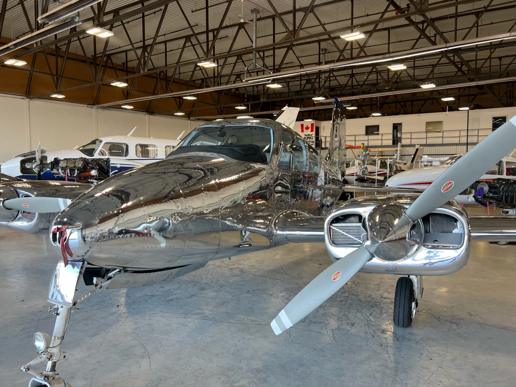 Mirror polished bare aluminium Cessna 310 aircraft detailing Ontario